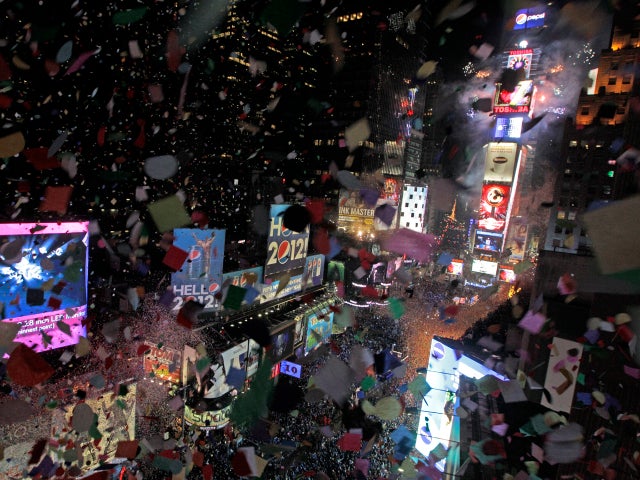 Confetti flies over New York's Times Square as the clock strikes midnight during a New Year's Eve celebration as seen from the balcony of the Marriott Marquis hotel Jan. 1, 2012. 