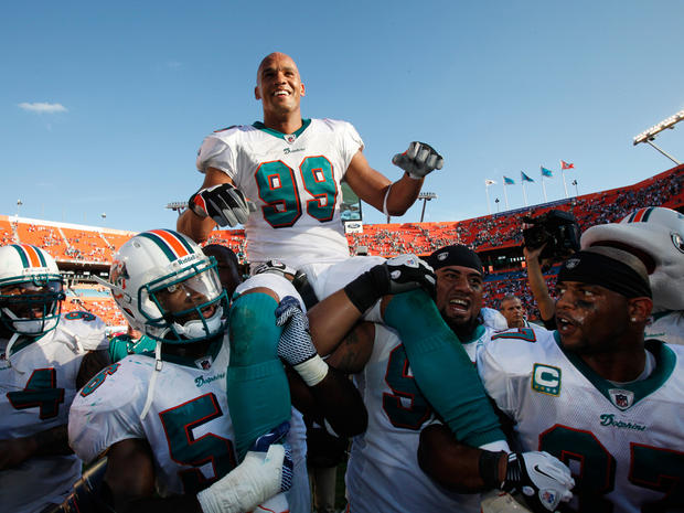 Jason Taylor is carried off the field 