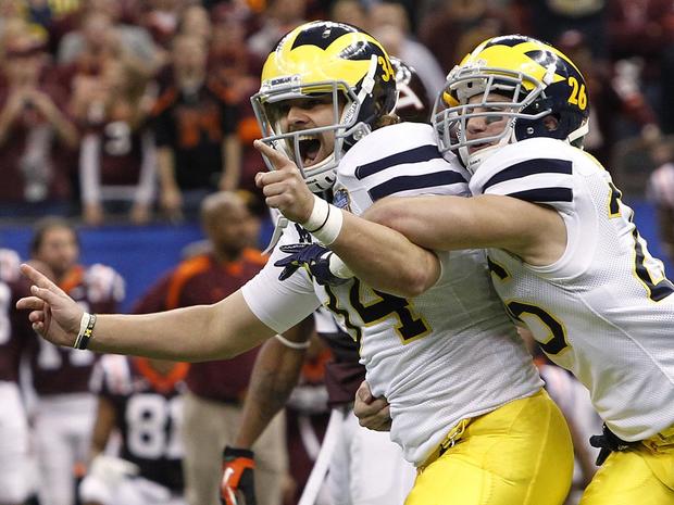 Brendan Gibbons is congratulated by Drew Dileo 