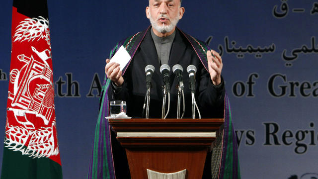 Afghan President Hamid Karzai speaks during a gathering in Kabul, Afghanistan, Dec. 31, 2011. 