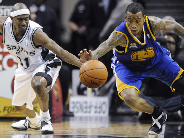 Monta Ellis steals the ball from T.J. Ford  