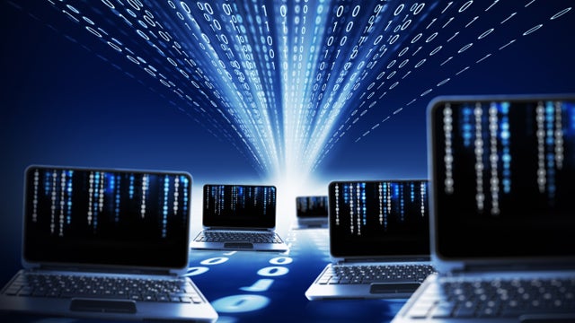 binary code and laptops 