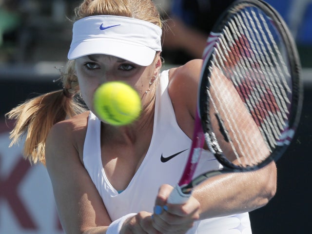 Sabine Lisicki makes a backhand return 