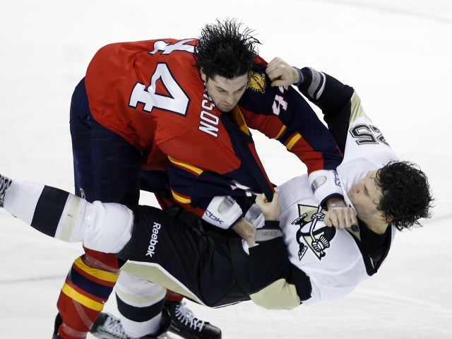 Erik Gudbranson and Eric Tangradi fight 