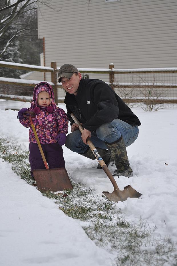 sydney-and-daddy-with-their-shovels-in-the-snow.jpg 
