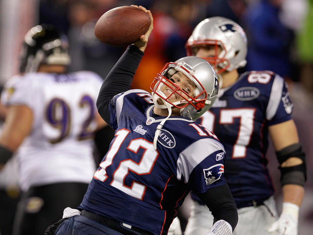 Tom Brady celebrates after scoring a one yard touchdown 