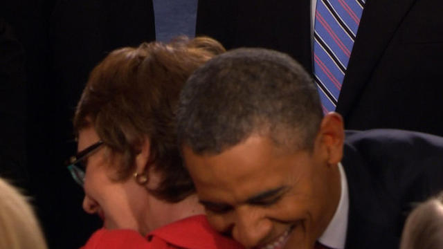 Obama greets Giffords with big hug  