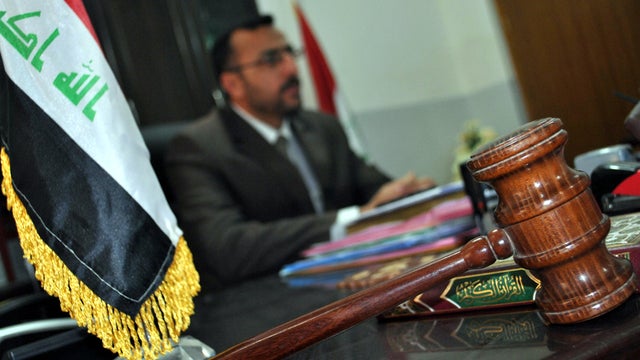 Iraqi Khalid Salman, a lawyer for the victims of the 2005 fatal shooting of 24 Iraqi civilians by U.S. troops in the town of Haditha, is seen Jan. 24, 2012, in his Haditha office. 