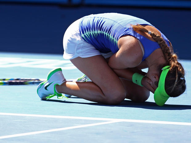 Victoria Azarenka celebrates after defeating Kim Clijsters 