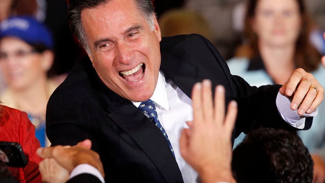 Former Massachusetts Gov. Mitt Romney greets supporters at his Florida primary night rally in Tampa, Fla., Jan. 31, 2012. 