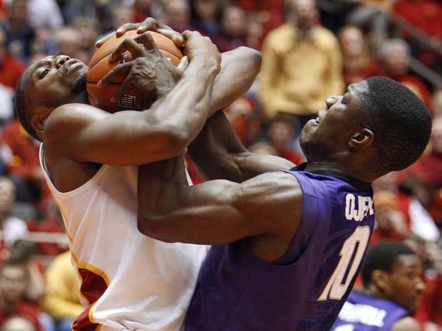 Melvin Ejim battles for a rebound  