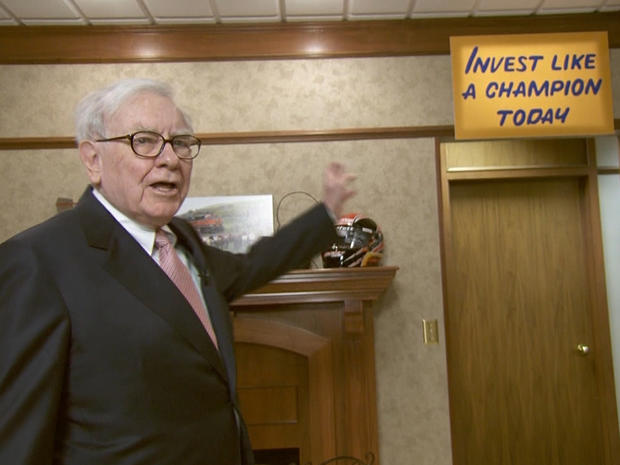 Warren Buffett's "invest like a champion" sign 