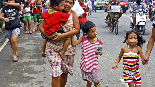 Residents rush to higher grounds following tsunami rumors 