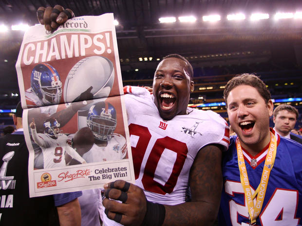 Jason Pierre-Paul celebrates after the Giants defeated the Patriots 