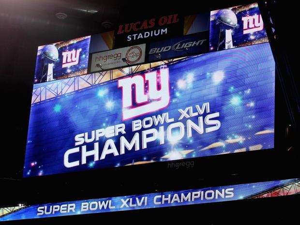 The scoreboard congratulating the New York Giants is seen after Super Bowl XLVI 