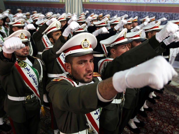 Iranian soldiers chant anti-Israeli and anti-U.S. slogans on the first day of celebrations marking the 33th anniversary of Ayatollah Ruhollah Khomeini's return from exile at Khomeini's mausoleum in Tehran, Iran, Feb. 1, 2012. 