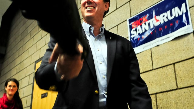 Former Pennsylvania Sen. Rick Santorum arrives at a campaign rally Feb. 7, 2012, in Blaine, Minn. 