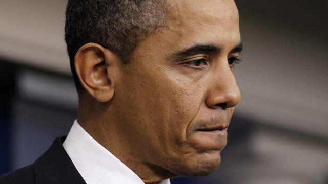 President Barack Obama pauses while announcing the revamp of his contraception policy  