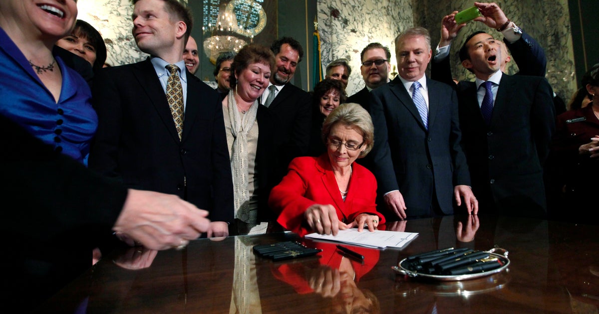 Washington state gov. signs gay marriage bill - CBS News