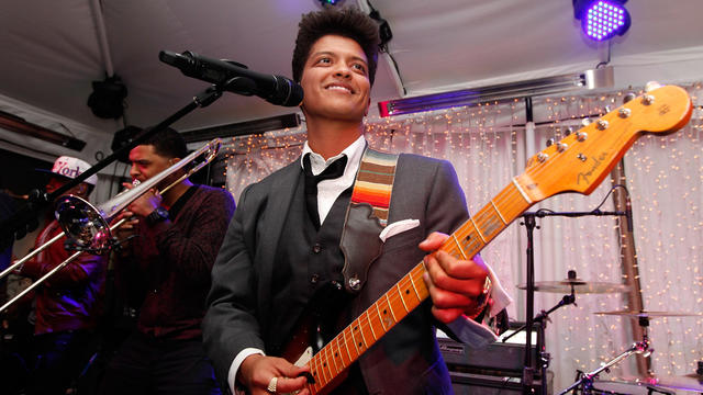 Musician Bruno Mars performs during the Warner Music Group Grammy Celebration hosted by InStyle 