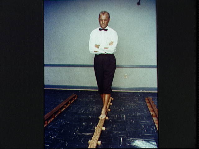 Glenn_on_balance_beam_-_NASA.jpg