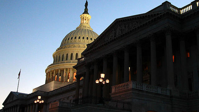 The U.S. Capitol is seen, Wednesday, Feb. 15, 2012, in Washington. Calling quits to a bruising election-year fight, negotiators on Capitol Hill worked into Wednesday night, ironing out final details of an agreement to extend a cut in the payroll taxes pai 