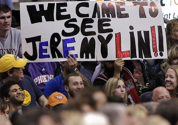 Fans hold a sign about New York Knicks' Jeremy Lin 