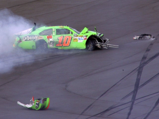 Danica Patrick car slides down the track after a crash 