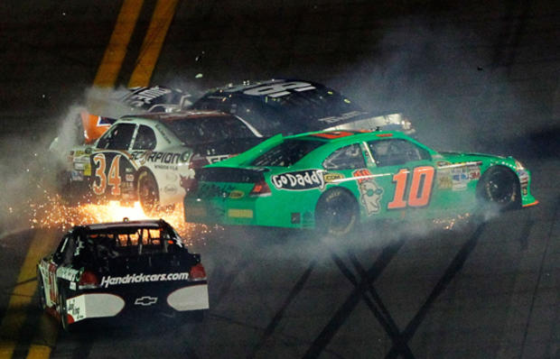 Danica Patrick, Jimmie Johnson, David Ragan spin after an on track incident 