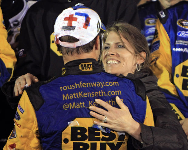 Matt Kenseth, left, gets a hug from his wife Katie after winning  