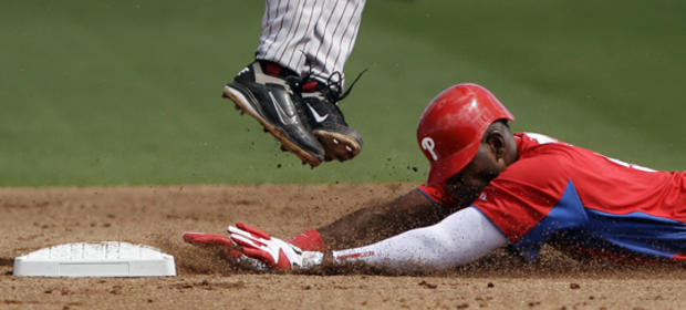 Domonic Brown steals second base 