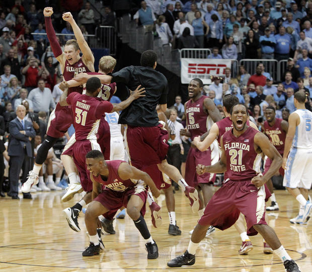 Michael Snaer and his teammates celebrate after defeating North Carolina  