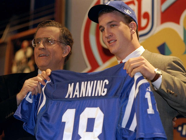 Peyton Manning displays an Indianapolis Colts jersey  