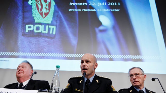 Committee leader Olav Soenderland, left, Police Director Oeystein Maeland, centre, and Oslo Chief of Police Anstein Gjengedal attend press conference in Oslo Thursday March, 15 2012. 