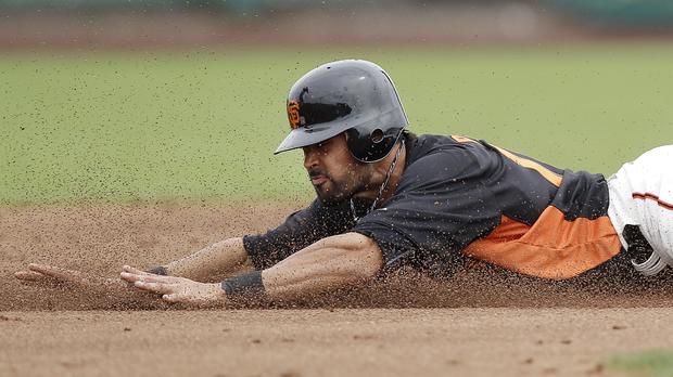Angel Pagan steals second base 