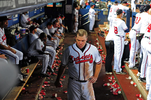 Chipper Jones paces the dugout after striking out  
