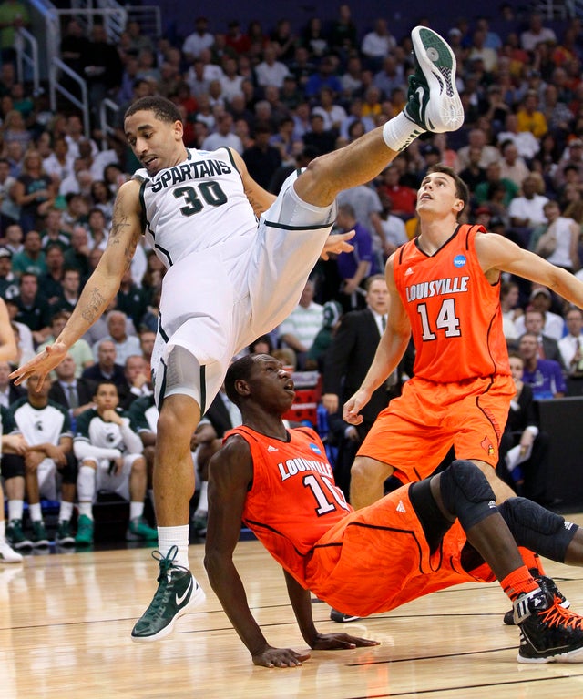 Brandon Wood fouls Gorgui Dieng 