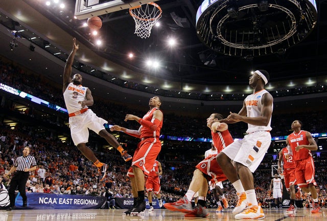 Dion Waiters drives for a layup against Jared Sullinger 