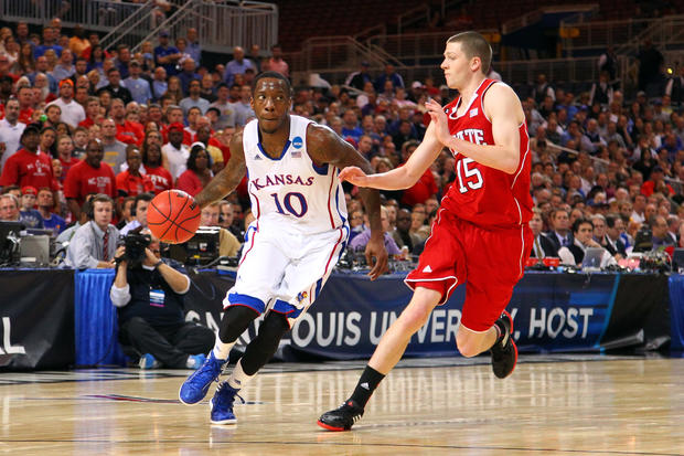 Tyshawn Taylor drives in the first half  