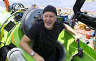 James Cameron emerges from the Deepsea Challenger submersible after his successful solo dive to the Mariana Trench 