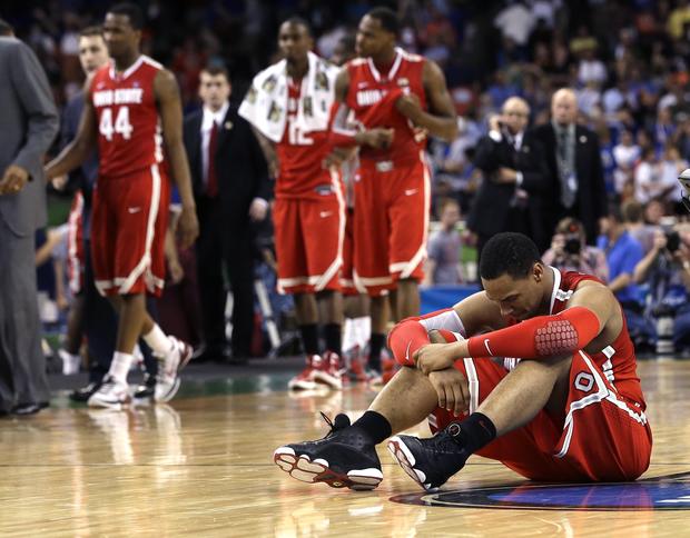 Jared Sullinger sits on the court after they lost to Kansas 