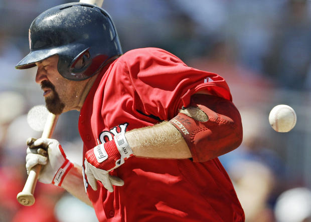 Kevin Youkilis reacts as he is hit by a pitch 