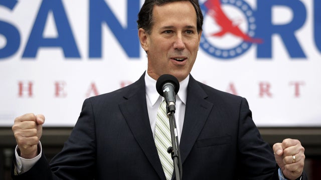 Rick Santorum addresses supporters outside the campaign headquarters  