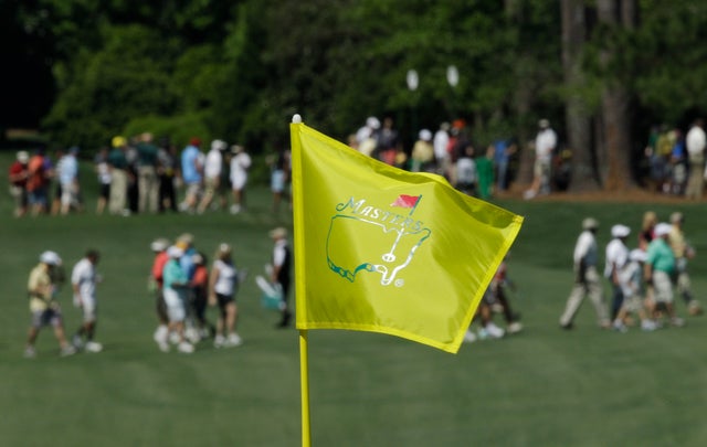 A Masters pin flaps in the wind on the seventh green  