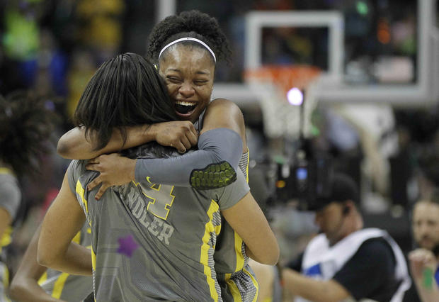 Odyssey Sims and  Mariah Chandler embrace 