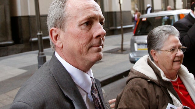 Rev. James J. Brennan departs the Criminal Justice Center on March 27, 2012 in Philadelphia.  