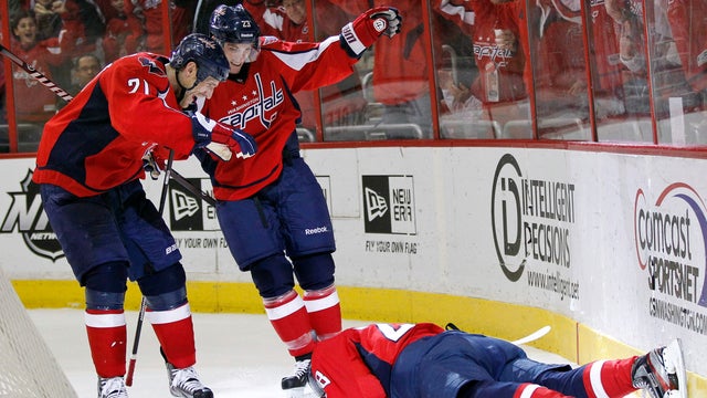 Brooks Laich and Keith Aucoin left 