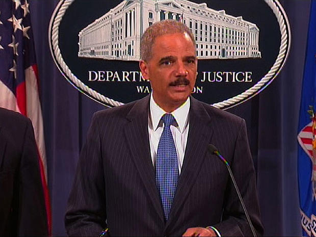 Attorney General Eric Holder speaks at a Department of Justice press conference announcing a government antitrust lawsuit against Apple Inc. and book publishers, April 11, 2012. 