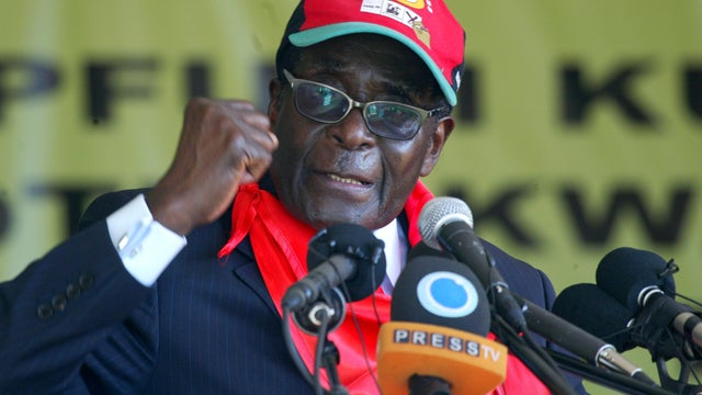Zimbabwe's President Robert Mugabe speaks during a rally marking his 88th birthday in Mutare, Zimbabwe, Feb. 25, 2012. 