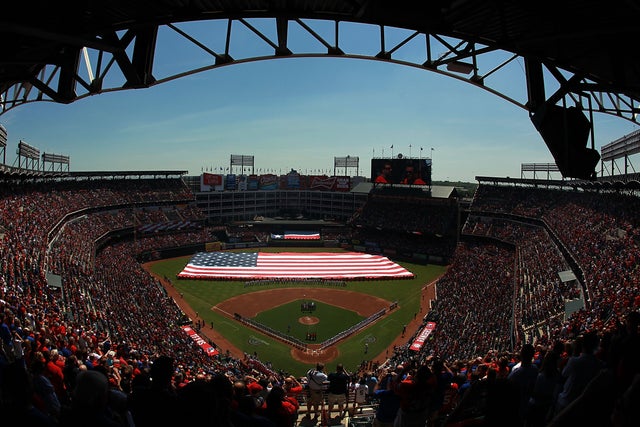 The American flag in the outfield during the national anthem 